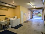 Tandem 2-car attached garage with in-unit washer and dryer